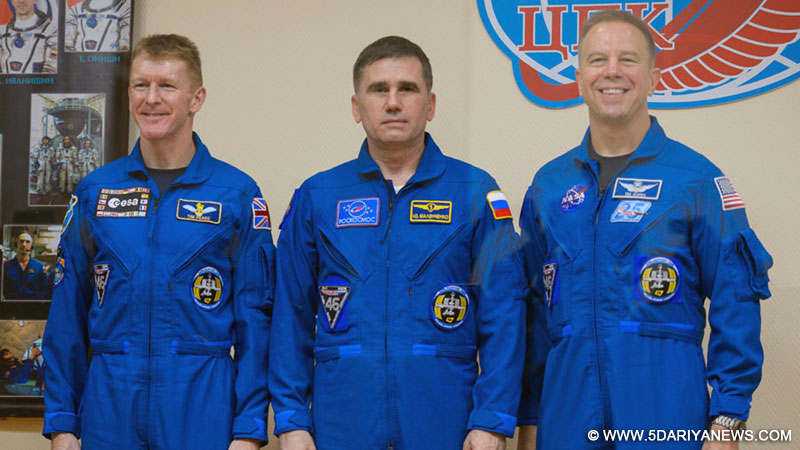From left, Expedition 46 flight engineer Tim Peake of ESA, Soyuz Commander Yuri Malenchenko of Roscosmos and flight engineer Tim Kopra of   NASA in Baikonur, Kazakhstan. 