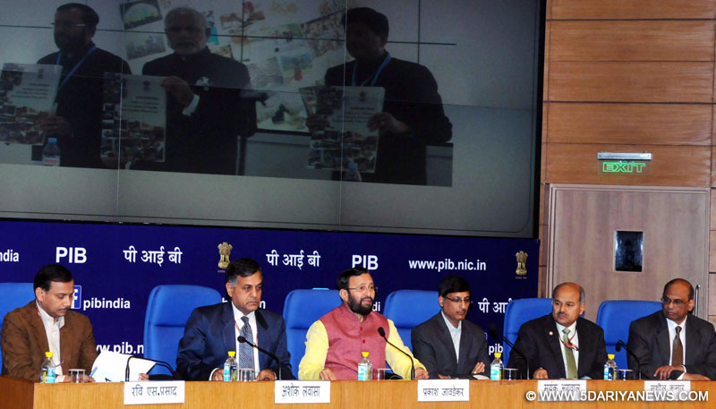 Prakash Javadekar addressing the press conference, in New Delhi on December 16, 2015. The Secretary, Ministry of Environment, Forest and Climate Change, Shri Ashok Lavasa and other dignitaries are also seen.