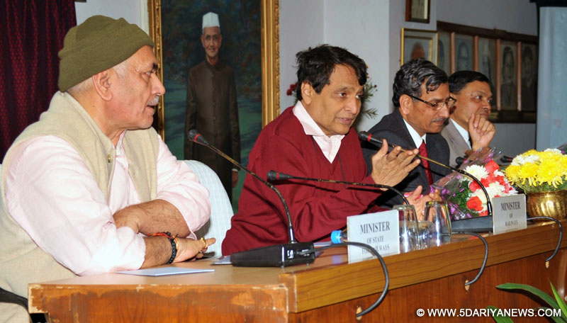 Union Minister for Railways Suresh Prabhakar Prabhu addresses at the signing ceremony of Memorandum of Understanding (MoUs) between Ministry of Railways and IIT/Kanpur, IIT/Roorkee and IIT/Madras for setting up Centres of Railway Research, in New Delhi on Dec 22, 2015. Also seen Minister of State for Railways Manoj Sinha