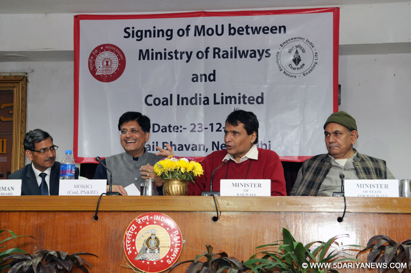 The Union Minister for Railways, Shri Suresh Prabhakar Prabhu with the Minister of State (Independent Charge) for Power, Coal and New and Renewable Energy, Shri Piyush Goyal addressing at the signing ceremony of a Memorandum of Understanding (MoU) between the Ministry of Railways and the Coal India Limited (CIL) (Under Ministry of Coal), regarding investment by the Coal India Limited (CIL) for procurement of wagons, in New Delhi on December 23, 2015. 