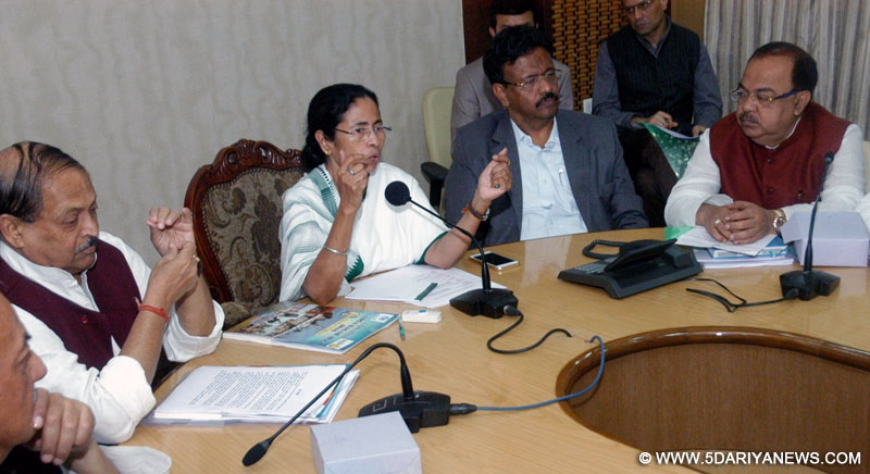 Howrah: West Bengal Chief Minister Mamata Banerjee during a press conference at Nabanna in Howrah, on Jan 4, 2016. Also seen West Bengal Ministers Firhad Hakim and Subrata Mukherjee.