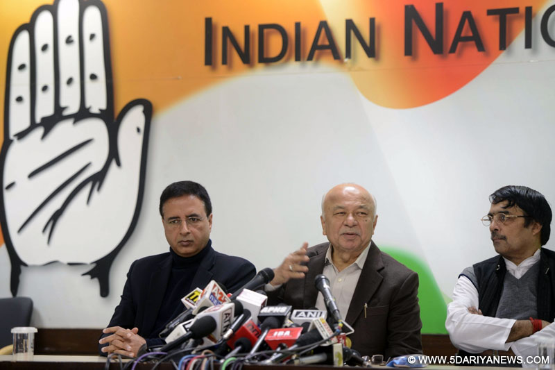 Congress leader Sushil Kumar Shinde addresses a press conference in New Delhi, on Jan 6, 2016. Also seen party leader Randeep Surjewala.