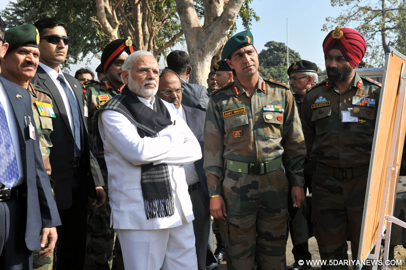 The Prime Minister, Shri Narendra Modi being given a presentation on counter-terrorist and combing operation by the Defence Forces, at Pathankot Airbase on January 09, 2016. The National Security Adviser, Shri Ajit Doval, the Chief of Army Staff, General Dalbir Singh and the Chief of the Air Staff, Air Chief Marshal Arup Raha are also seen.