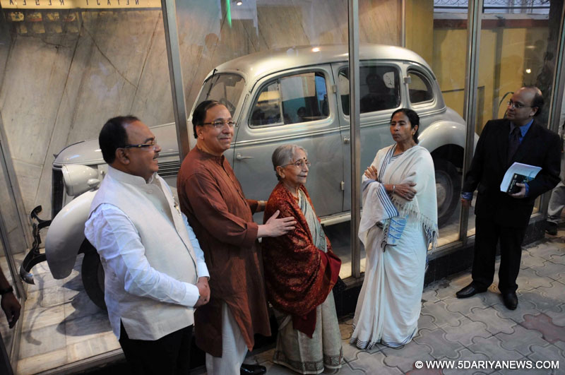 West Bengal Chief Minister Mamata Banerjee and Kolkata Mayor Sovan Chatterjee with Krishna Bose and Sugata Bose in front of the car used by Netaji Subhash Chandra Bose in his Great Escape at Netaji Bhavan, on the 75th anniversary of his 