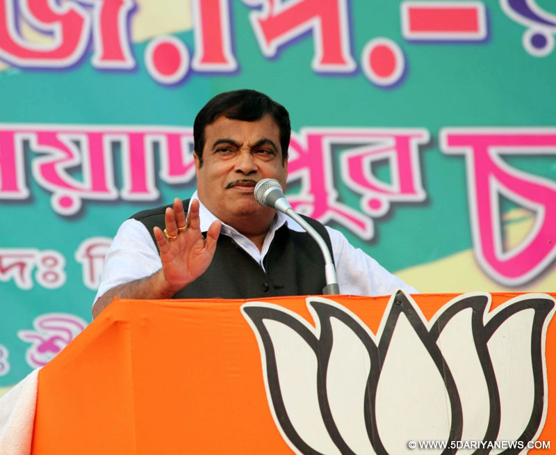 Union Road Transport, Highways and Shipping Minister Nitin Gadkari addresses during a BJP rally in Buniadpur of South Dinajpur of West Bengal, on Jan 18, 2016.