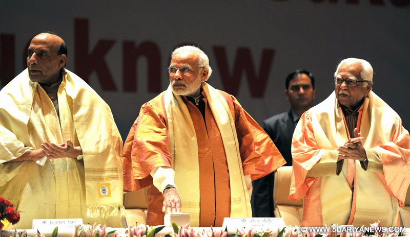 The Prime Minister, Narendra Modi unveiling the Students Activity Centre at Babasaheb Bhimrao Ambedkar University, at Lucknow, in Uttar Pradesh on January 22, 2016. The Governor of Uttar Pradesh, Ram Naik and the Union Home Minister, Rajnath Singh are also seen.