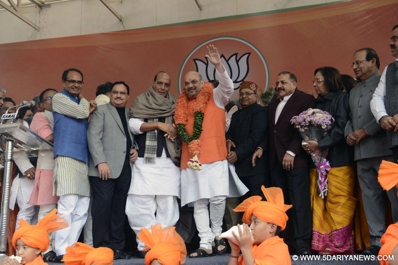 New Delhi: Union Ministers and BJP leaders Rajnath Singh, Jitendra Singh, JP Nadda, Najma Heptulla and others with Amit Shah after he was re-elected BJP president in New Delhi on Jan 24, 2016. Also seen Madhya Pradesh Chief Minister Shivraj Singh Chouhan. 