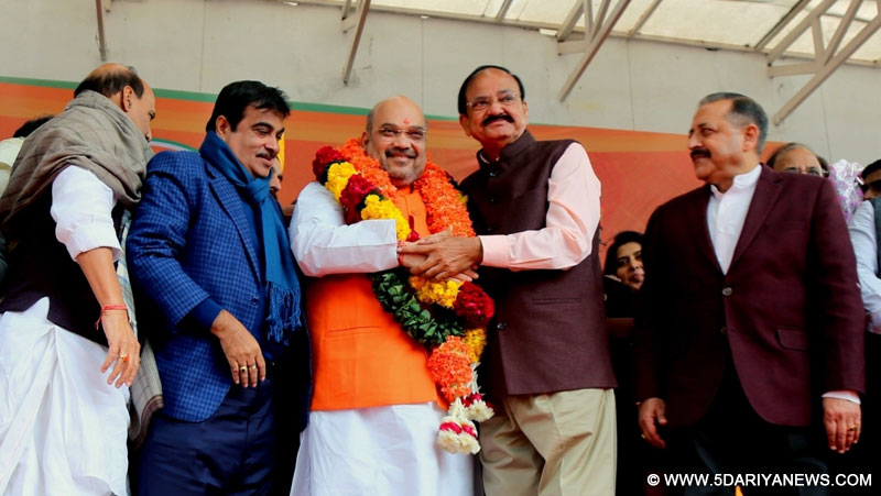 Union Ministers and BJP leaders Rajnath Singh, Nitin Gadkari, Venkaiah Naidu and others with Amit Shah after he was re-elected BJP president in New Delhi on Jan 24, 2016. 