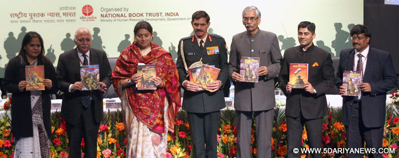 Smriti Irani along with the Chief of Army Staff, General Dalbir Singh and the Chairman of NBT, Shri Baldeo Bhai Sharma releasing the 