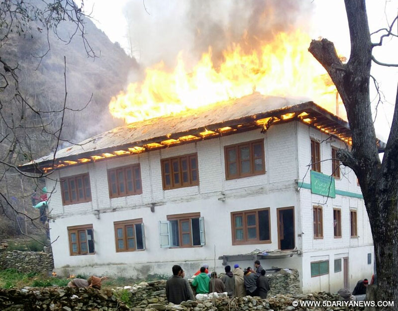 Fire breaks out at the historical Jamia mosque at Bijahama village in Uri, Baramulla district on Jan 26, 2016. 