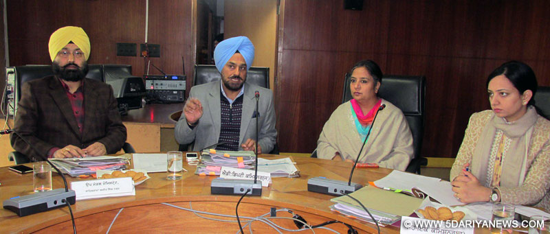 Deputy Commissioner presiding over a meeting to review the progress of various development works of the district.