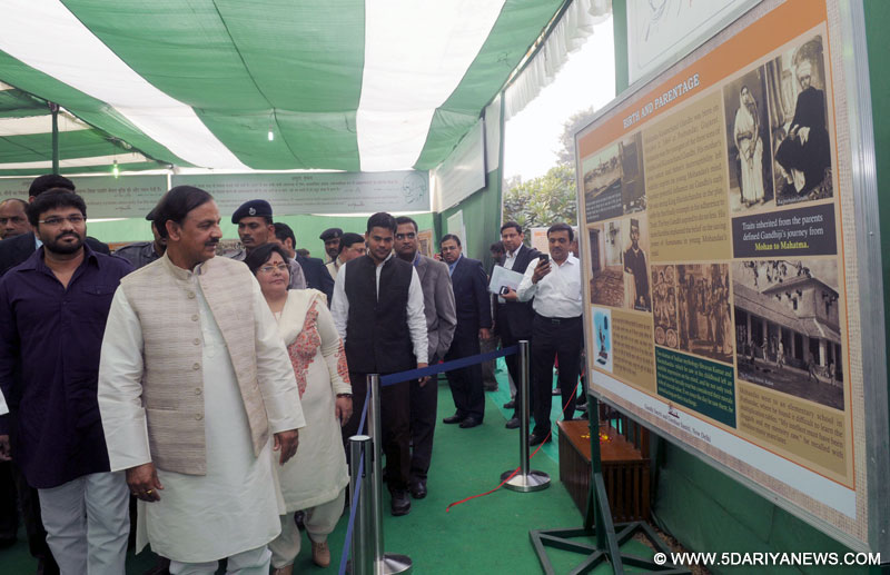 The Minister of State for Culture (Independent Charge), Tourism (Independent Charge) and Civil Aviation, Dr. Mahesh Sharma visiting after inaugurating the exhibition ‘Mohan Se Mahatma Tak’, on the 68th death anniversary of Mahatma Gandhi, at Rajghat Samadhi Samiti, in Delhi on January 30, 2016. The Minister of State for Urban Development, Housing and Urban Poverty Alleviation, Shri Babul Supriyo is also seen.