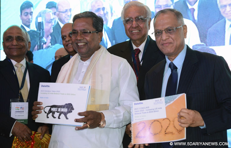 Karnataka Chief Minister Siddaramaiah and Infosys co-founder NR Narayana Murthy during the inauguration of the IAAC Conclave, Vision 2020, organised by Indo American Chamber of Commerce at Hotel Ashok, in Bengaluru, on Jan 29, 2016. Also seen Minister Counselor for Commercial affairs, US Embassy John Mccaslin, National President IAAC Dr Lalit Kanodia and others.