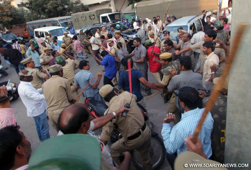  Police cane charge to control an ugly spat between MIM activists and Congress workers near Mir Chowk during the Greater Hyderabad Municipal Corporation (GHMC) polls in Hyderabad on Feb 2, 2016. 