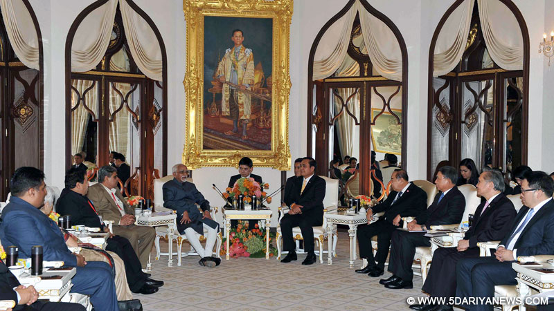 The Vice President, Shri M. Hamid Ansari discussing bilateral issues with the Prime Minister of Thailand, General Prayut Chan-o-cha, in Government House, Bangkok on February 03, 2016. The Minister of State for Home Affairs, Shri Haribhai Parthibhai Chaudhary is also seen.