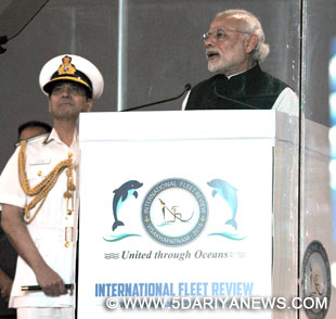 The Prime Minister, Shri Narendra Modi addressing at the International Fleet Review-2016, at Visakhapatnam on February 07, 2016. The Chief of Naval Staff, Admiral R.K. Dhowan is also seen.