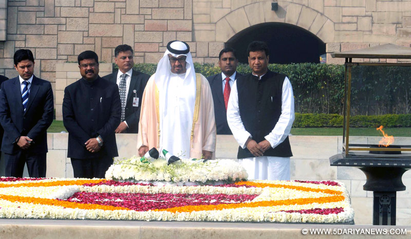 The Crown Prince of Abu Dhabi, His Highness Sheikh Mohammed Bin Zayed Al Nahyan paying homage at the Samadhi of Mahatma Gandhi, at Rajghat, in Delhi on February 11, 2016. The Minister of State for Petroleum and Natural Gas (Independent Charge), Shri Dharmendra Pradhan is also seen.