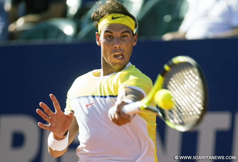 Spanish tennis player Rafael Nadal hits a return to Italia