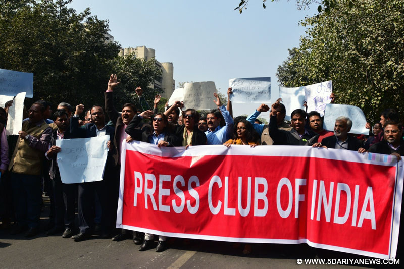 Journalists participate at a march rally to Supreme Court in protest against the `manhandling of reporters` at Patiala House Court in New Delhi on Feb 16, 2016.
