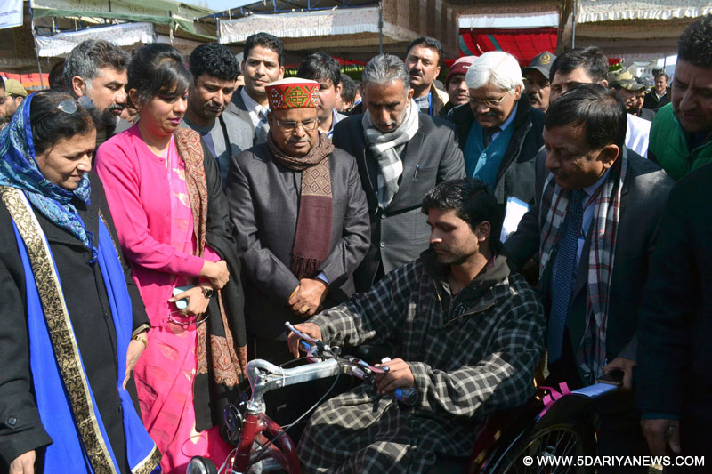 The Union Minister for Social Justice and Empowerment, Shri Thaawar Chand Gehlot distributing the aids and assistive devices to the persons with disabilities, at Baramulla on February 16, 2016. The Minister of State for Social Justice & Empowerment, Shri Krishan Pal is also seen.