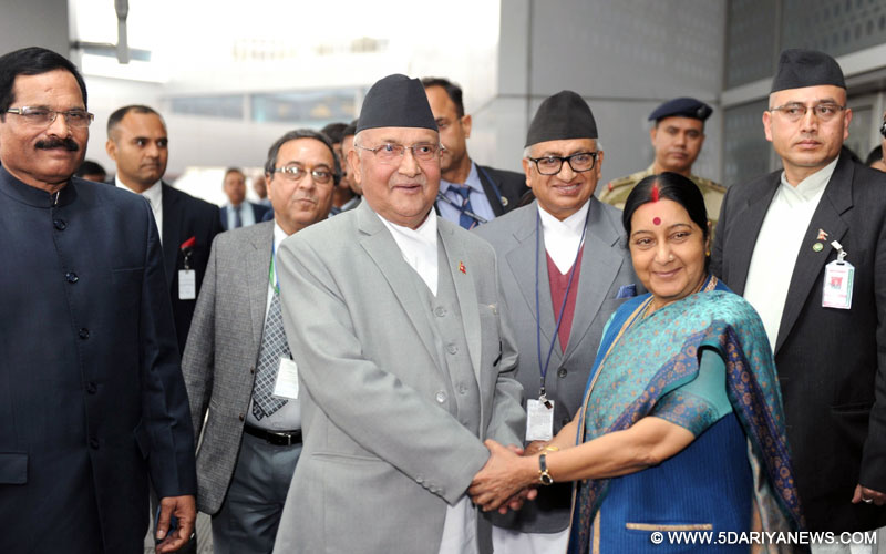 Nepal Prime Minister K.P. Sharma Oli being received by the Union Minister for External Affairs Sushma Swaraj on his arrival, at Indira Gandhi International Airport, in New Delhi on Feb 19, 2016. Also seen the Minister of State for AYUSH (Independent Charge) and Health & Family Welfare Shripad Yesso Naik. 