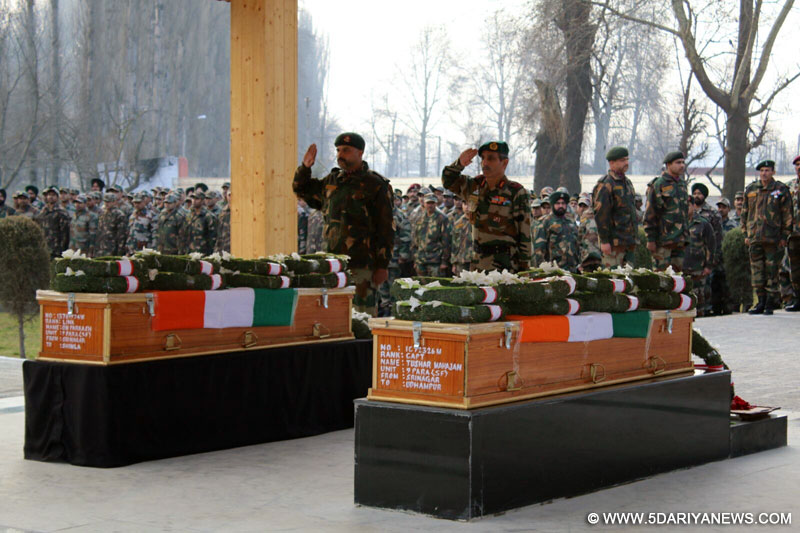 Army officers pay their last respect to Captain Tushar Mahajan and Lance Naik Om Prakash who were killed during an encounter with militants in Pampore of Jammu and Kashmir; at Badami Bagh Cantonment, Srinagar on Feb 22, 2016.