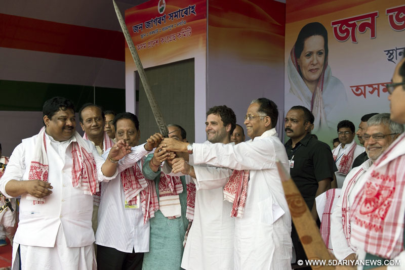Congress vice president Rahul Gandhi with Assam Chief Minister Tarun Gogoi and others during a election campaign rally in Nagaon near Guwahati on March 5, 2016. 