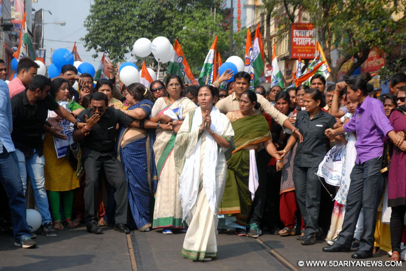 West Bengal Chief Minister Mamata Banerjee leads a march from Shyambazar to Dharamtala on International Women