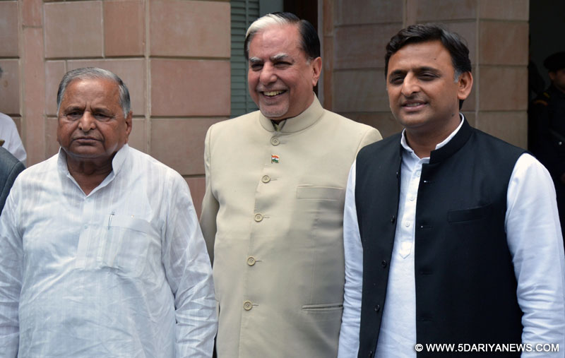 Uttar Pradesh Chief Minister Akhilesh Yadav and Samajwadi Party supremo Mulayam Singh Yadav with Essel group chairman Subhash Chandra in Lucknow, on March 14, 2016. 