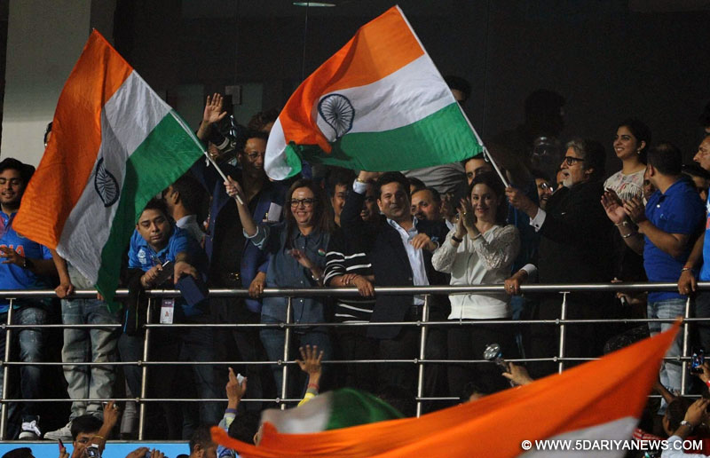 Former Indian cricketer Sachin Tendulkar and Megastar Amitabh Bachchan celebrates India`s win against Pakistan during the ICC WT20 2016 match between India and Pakistan at Eden Gardens in Kolkata on March 19, 2016. Also seen Reliance Foundation chairperson Nita Ambani.