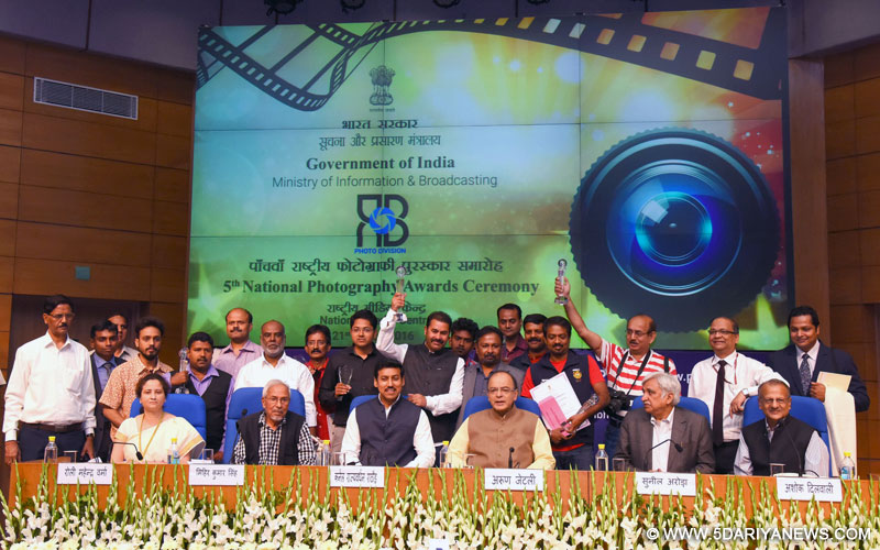The Union Minister for Finance, Corporate Affairs and Information & Broadcasting, Shri Arun Jaitley with the recipients of the 5th National Photography Awards, at a function, in New Delhi on March 21, 2016. The Minister of State for Information & Broadcasting, Col. Rajyavardhan Singh Rathore, the Secretary, Ministry of Information and Broadcasting, Shri Sunil Arora, the Director, Photo Division, Ministry of Information & Broadcasting, Ms. Rolly Mahendra Varma and other dignitaries are also seen.