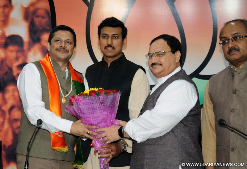 Kargil war hero Colonel Diptanshu Choudhry joins BJP in presence of union ministers JP Nadda and Rajyavardhan Singh Rathore in New Delhi, on March 18, 2016.