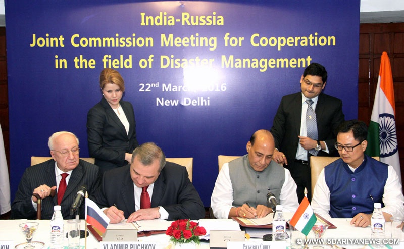 The Union Home Minister, Shri Rajnath Singh and the Minister of Civil Defence, Emergencies and Elimination of Consequences of Natural Disasters of the Russian Federation, Mr. Vladimir Puchkov signing the Joint Implementation Plan, during the India-Russia Joint Commission meeting for Cooperation in the field of Disaster Management, in New Delhi on March 22, 2016. The Minister of State for Home Affairs, Shri Kiren Rijiju is also seen. 