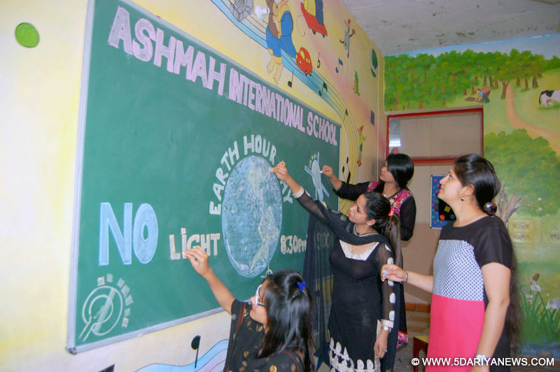 Ashmah International School organized a seminar to conserve electricity and urged students to switch off the light on earth hour