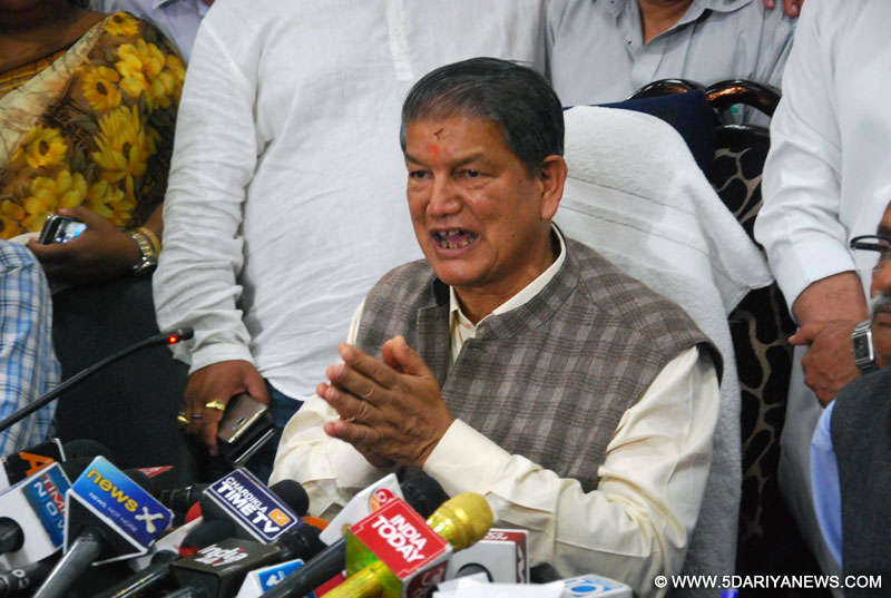 Uttarakhand CM blames dissidents, Modi for President