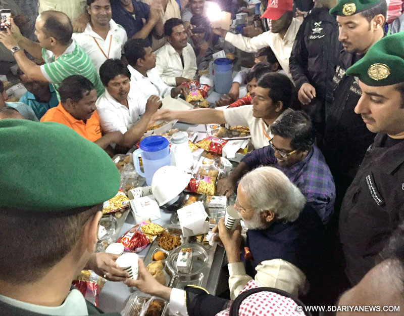 The Prime Minister, Shri Narendra Modi sharing snacks with workers at the L&T residential complex, in Riyadh, Saudi Arabia on April 02, 2016.
