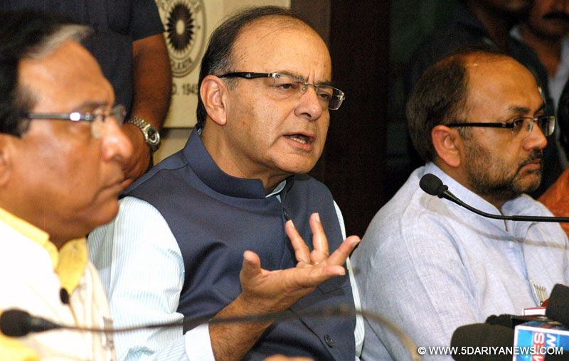 Kolkata: Union Minister for Finance, Corporate Affairs, and Information and Broadcasting Arun Jaitley addresses a press conference in Kolkata on April 10, 2016. 