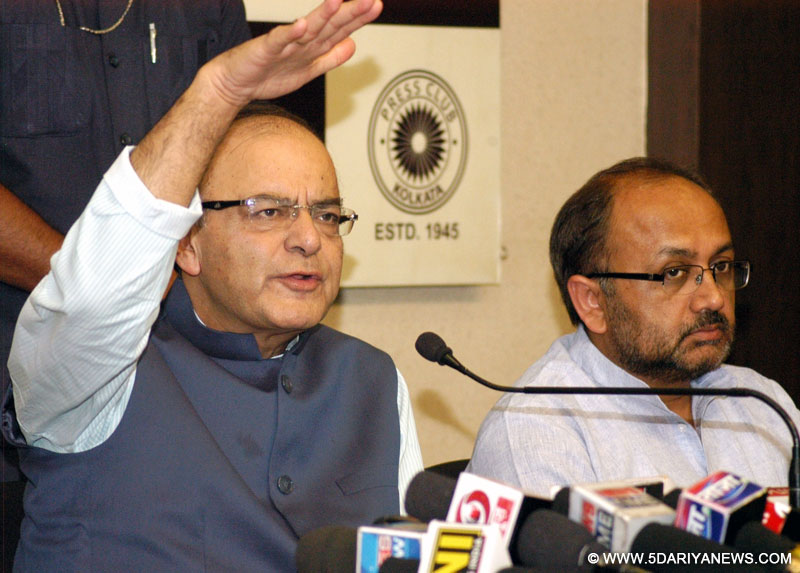 Union Minister for Finance, Corporate Affairs, and Information and Broadcasting Arun Jaitley addresses a press conference in Kolkata on April 10, 2016. 
