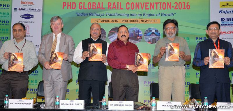 The Minister of State for Development of North Eastern Region (I/C), Prime Minister’s Office, Personnel, Public Grievances & Pensions, Department of Atomic Energy, Department of Space, Dr. Jitendra Singh releasing a book on Indian Railways at the “Global Rail Convention”, organised by the PHD Chamber, in New Delhi on April 13, 2016. 