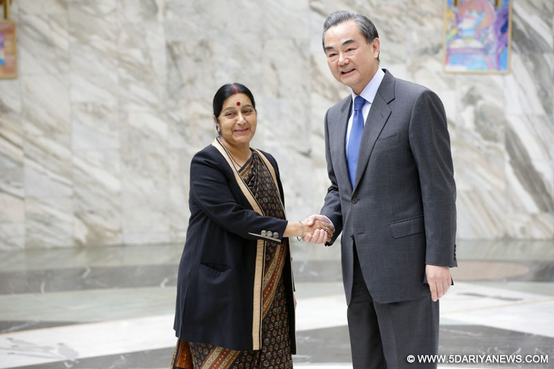 External Affairs Minister Sushma Swaraj meets Wang Yi, Foreign Minister of China in Moscow on April 18, 2016.