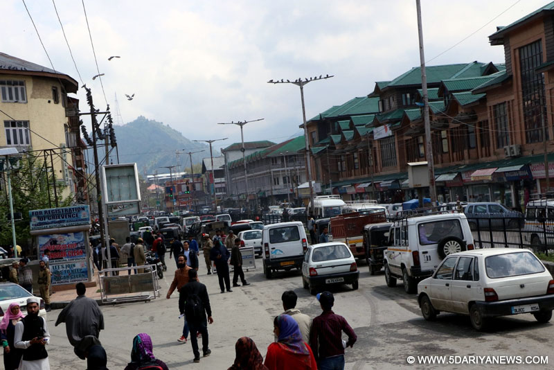 Normal life resumes in Srinagar after five days of restrictions on April 18, 2016. 