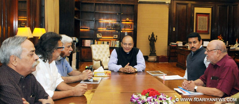 Shyam Benegal Committee submits its report on Cinematograph Act/Rules to the Union Minister for Finance, Corporate Affairs and Information & Broadcasting Arun Jaitley, in New Delhi on April 26, 2016. Also seen Union Minister of State for Information and Broadcasting Col. Rajyavardhan Singh Rathore, and others. 