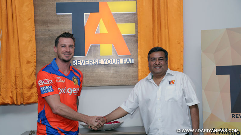 Gujarat Lions player Dale Steyn with Gulshan Jhurani, founder, TAF Wellness during the launch of the centre in New Delhi.