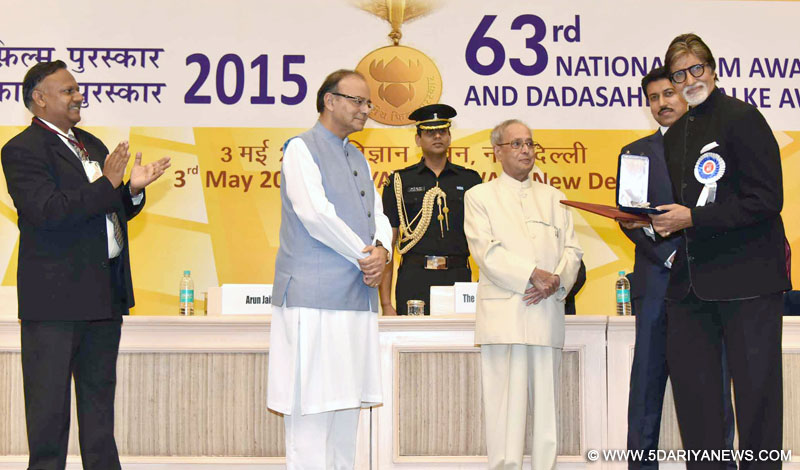 The President, Shri Pranab Mukherjee presenting the Rajat Kamal Award to the Actor Shri Amitabh Bachhan (Best Actor) for Piku, at the 63rd National Film Awards Function, in New Delhi on May 03, 2016. The Union Minister for Finance, Corporate Affairs and Information & Broadcasting, Shri Arun Jaitley, the Minister of State for Information & Broadcasting, Col. Rajyavardhan Singh Rathore and the Secretary, Ministry of Information & Broadcasting, Shri Ajay Mittal are also seen.