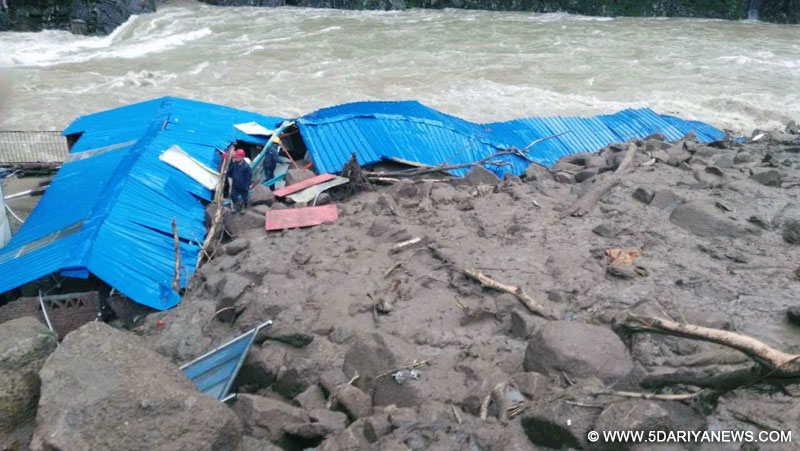 Photo taken by a mobile phone shows the landslide site in Taining County of Sanming City, southeast China