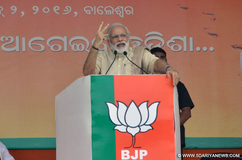 Prime Minister Narendra Modi addresses a BJP rally in Balasore district of Odisha on June 2, 2016. 