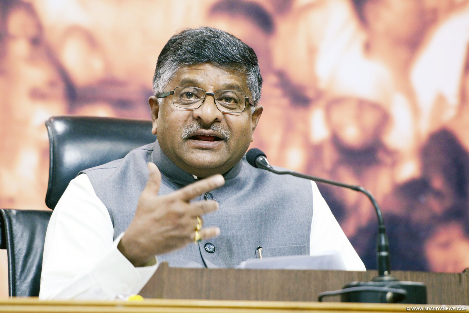 Ravi Shankar Prasad addressing a press conference on the achievements of the Ministry of C&IT during the two years of NDA Government, in New Delhi on May 30, 2016. The Secretary (Telecom), Shri J.S. Deepak and the Director General (M&C), Press Information Bureau, Shri A.P. Frank Noronha are also seen.