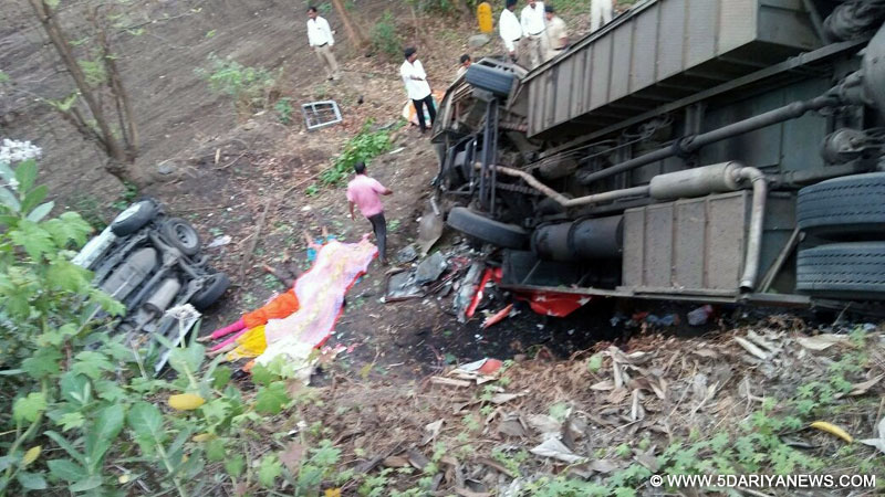 The mangled remains of the bus and the cars that met with an accident on the Mumbai-Pune Expressway (E-Way) near Panvel of Maharashtra on June 5, 2016. At least 17 persons were killed and 21 others injured in the accident. 