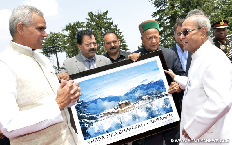President of India Shri Pranab Mukherjee being presented a memento at Kalyani Helipad Shimla on 6 June 2016.