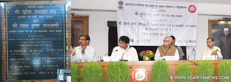  The Union Minister for Railways, Shri Suresh Prabhakar Prabhu laying the foundation stone for Ahmadabad-Mehsana Gauge conversion project with electrification, through video conferencing from Rail Bhawan, in New Delhi on June 08, 2016. The Member of Parliament and former Deputy Prime Minister of India, Shri L.K. Advani and the Chairman, Railway Board, Shri A.K. Mital are also seen.